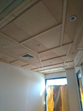 plywood panels on celing with poplar trim on stage left